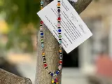 Handmade bracelet hanging on tree